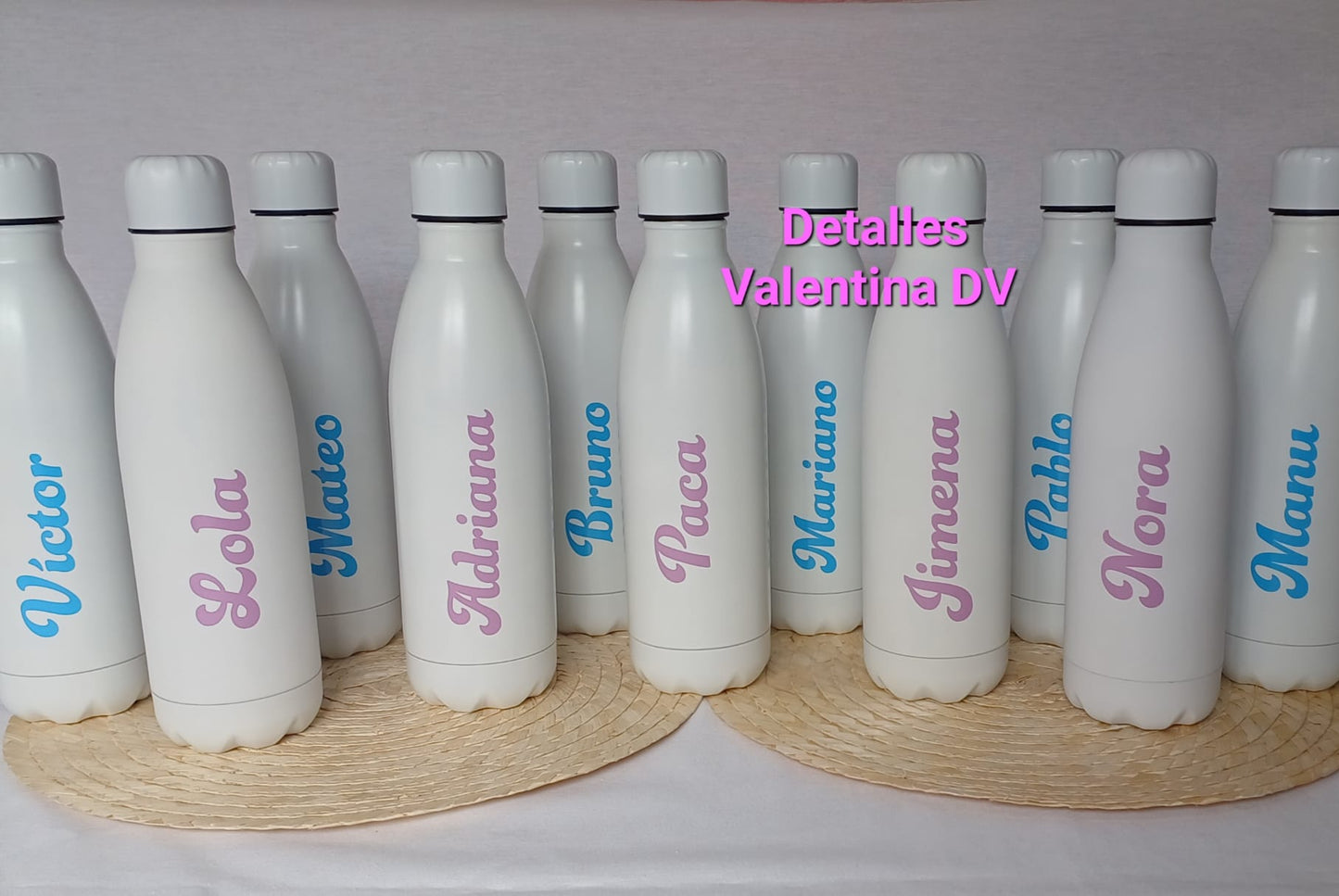 Botella 700 ml. en color con nombre