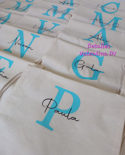 Pack personalizado de mochila de algodón y bidón con inicial y nombre